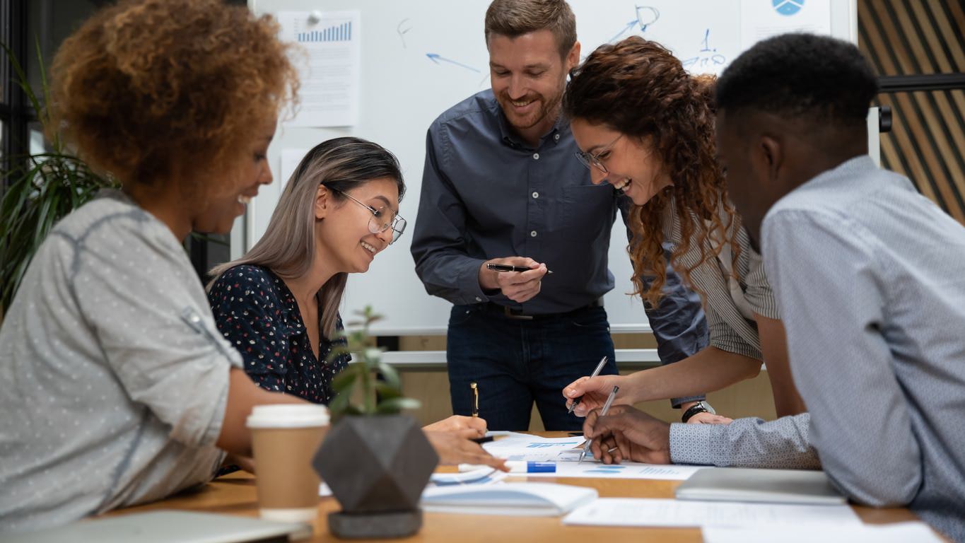 team of coworkers building a successful business